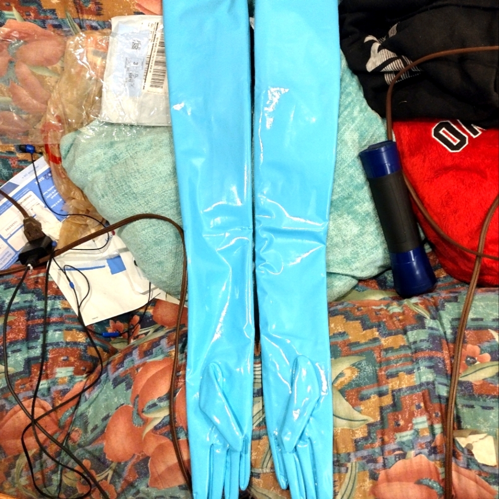 They are a pair of light blue Long length latex gloves.